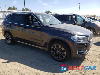 Czwarte zdjęcie samochodu z boku: 2018 BMW X5 XDR40E VIN:5UXKT0C57J0W00358 - miniatura