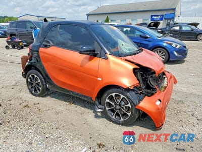 Czwarte zdjęcie samochodu z boku: 2016 SMART EQ FORTWO VIN:WMEFJ5DA5GK055745 - miniatura