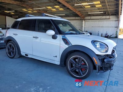 Czwarte zdjęcie samochodu z boku: 2014 MINI COOPER COUNTRYMAN JCW VIN:WMWXD1C52EWS34657 - miniatura
