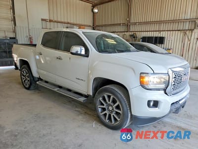 Czwarte zdjęcie samochodu z boku: 2019 GMC CANYON DENALI VIN:1GTG5EENXK1153273 - miniatura