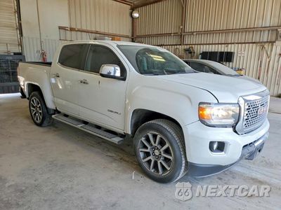 Czwarte zdjęcie samochodu z boku: 2019 GMC CANYON DENALI VIN:1GTG5EENXK1153273 - miniatura