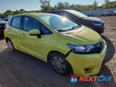 Czwarte zdjęcie samochodu z boku: 2015 HONDA FIT LX VIN:3HGGK5H51FM717598 - miniatura