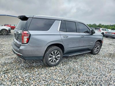Trzecie zdjęcie samochodu z tyłu: 2021 CHEVROLET TAHOE C1500 LT VIN:1GNSCNKD4MR325403 - miniatura