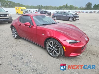 Czwarte zdjęcie samochodu z boku: 2023 MAZDA MX-5 MIATA GRAND TOURING VIN:JM1NDAM71P0561275 - miniatura