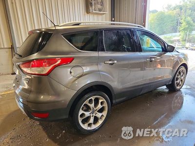 Trzecie zdjęcie samochodu z tyłu: 2014 FORD ESCAPE TITANIUM VIN:1FMCU0J97EUB39729 - miniatura