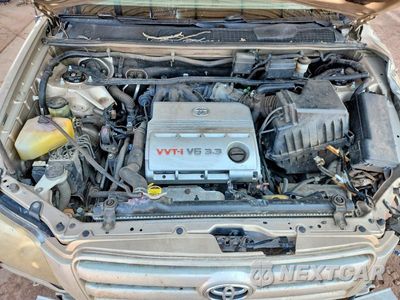 Zdjęcie 12 z 14 samochodu: 2005 TOYOTA HIGHLANDER BASE VIN:JTEEP21AX50133940 - miniatura