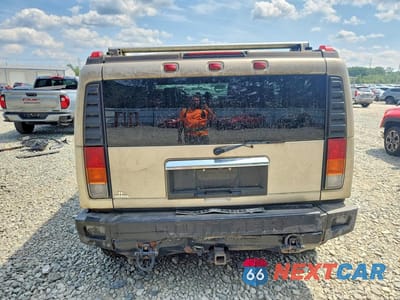 Zdjęcie 6 z 13 samochodu: 2004 HUMMER H2 VIN:5GRGN23U64H117419 - miniatura