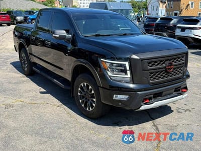 Czwarte zdjęcie samochodu z boku: 2023 NISSAN TITAN PRO-4X VIN:1N6AA1ED3PN104690 - miniatura