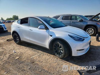 Czwarte zdjęcie samochodu z boku: 2022 TESLA MODEL Y VIN:7SAYGDEE4NA018570 - miniatura