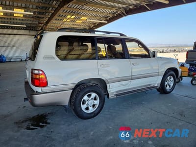 Trzecie zdjęcie samochodu z tyłu: 2000 TOYOTA LAND CRUISER BASE VIN:JT3HT05J1Y0096815 - miniatura
