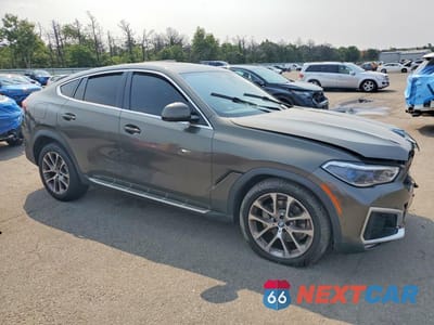 Czwarte zdjęcie samochodu z boku: 2021 BMW X6 XDRIVE40I VIN:5UXCY6C02M9G65117 - miniatura