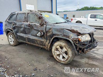 Czwarte zdjęcie samochodu z boku: 2013 JEEP GRAND CHEROKEE LAREDO VIN:1C4RJFAG9DC581408 - miniatura