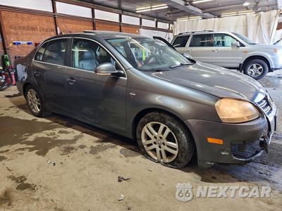 Czwarte zdjęcie samochodu z boku: 2007 VOLKSWAGEN JETTA WOLFSBURG VIN:3VWEF71K57M177290 - miniatura