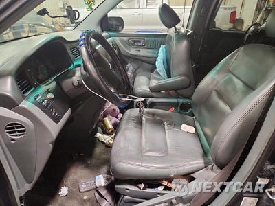 Zdjęcie 7 z 13 samochodu: 2004 HONDA ODYSSEY EXL VIN:2HKRL189X4H500926 - miniatura