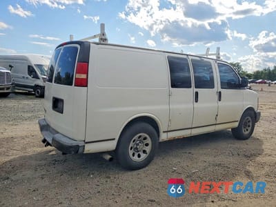 Czwarte zdjęcie samochodu z boku: 2011 CHEVROLET EXPRESS G1500 VIN:1GCSGAFX6B1105721 - miniatura