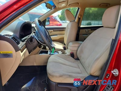 Zdjęcie 7 z 13 samochodu: 2010 HYUNDAI SANTA FE GLS VIN:5NMSG3AB8AH404235 - miniatura