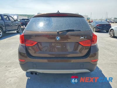 Zdjęcie 6 z 13 samochodu: 2014 BMW X1 SDRIVE28I VIN:WBAVM1C5XEVW51473 - miniatura