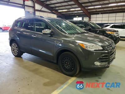 Czwarte zdjęcie samochodu z boku: 2015 FORD ESCAPE SE VIN:1FMCU9G98FUA56517 - miniatura