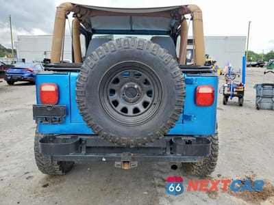 Zdjęcie 6 z 12 samochodu: 1994 JEEP WRANGLER / YJ SAHARA VIN:1J4FY49S2RP421926 - miniatura