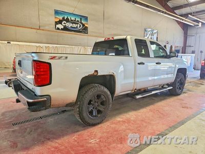 Trzecie zdjęcie samochodu z tyłu: 2014 CHEVROLET SILVERADO K1500 LT VIN:1GCVKREC2EZ297993 - miniatura