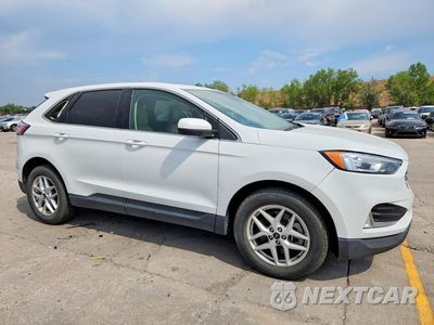 Czwarte zdjęcie samochodu z boku: 2023 FORD EDGE SEL VIN:2FMPK4J92PBA12720 - miniatura