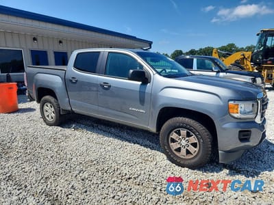 Czwarte zdjęcie samochodu z boku: 2020 GMC CANYON VIN:1GTG5BEA8L1105414 - miniatura