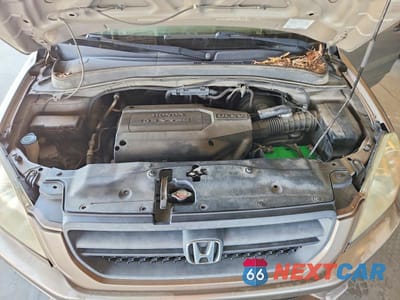 Zdjęcie 12 z 13 samochodu: 2004 HONDA PILOT EXL VIN:2HKYF18504H518707 - miniatura