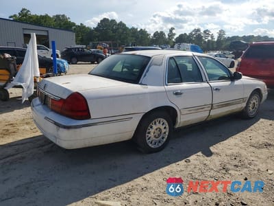 Trzecie zdjęcie samochodu z tyłu: 2003 MERCURY GRAND MARQUIS VIN:2MEFM74W23X680400 - miniatura