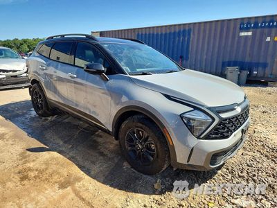 Czwarte zdjęcie samochodu z boku: 2023 KIA SPORTAGE X-PRO VIN:5XYK7CAF1PG072984 - miniatura