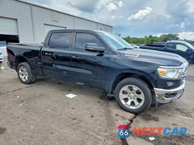 Czwarte zdjęcie samochodu z boku: 2023 RAM 1500 BIG HORN/LONE STAR VIN:1C6SRFMTXPN543351 - miniatura