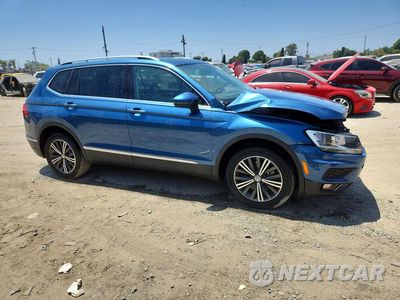 Czwarte zdjęcie samochodu z boku: 2019 VOLKSWAGEN TIGUAN SE VIN:3VV3B7AX4KM189538 - miniatura