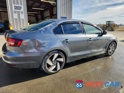 Trzecie zdjęcie samochodu z tyłu: 2018 VOLKSWAGEN JETTA S VIN:3VW2B7AJ9JM215312 - miniatura