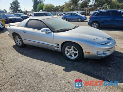 Czwarte zdjęcie samochodu z boku: 1999 PONTIAC FIREBIRD VIN:2G2FS22KXX2224078 - miniatura