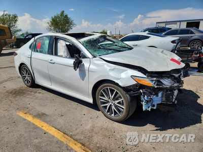 Czwarte zdjęcie samochodu z boku: 2024 TOYOTA CAMRY XLE VIN:4T1F31AK2RU628800 - miniatura