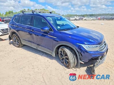 Czwarte zdjęcie samochodu z boku: 2022 VOLKSWAGEN TIGUAN SE VIN:3VV3B7AX9NM098754 - miniatura