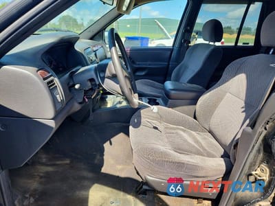 Zdjęcie 7 z 13 samochodu: 2000 JEEP GRAND CHEROKEE LAREDO VIN:1J4G248S8YC113978 - miniatura