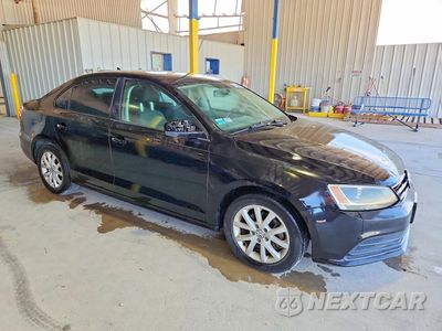 Czwarte zdjęcie samochodu z boku: 2015 VOLKSWAGEN JETTA SE VIN:3VWD07AJ6FM419619 - miniatura
