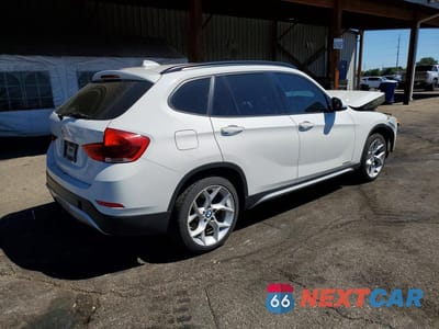 Trzecie zdjęcie samochodu z tyłu: 2013 BMW X1 XDRIVE35I VIN:WBAVM5C55DVV89051 - miniatura