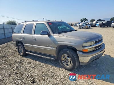 Czwarte zdjęcie samochodu z boku: 2002 CHEVROLET TAHOE K1500 VIN:1GNEK13T72R163150 - miniatura