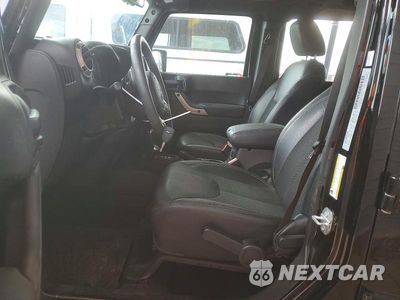 Zdjęcie 7 z 13 samochodu: 2017 JEEP WRANGLER UNLIMITED SAHARA VIN:1C4BJWEG5HL564672 - miniatura