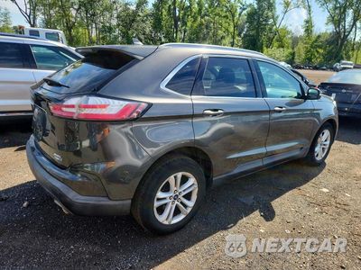 Trzecie zdjęcie samochodu z tyłu: 2020 FORD EDGE SEL VIN:2FMPK4J93LBA19069 - miniatura