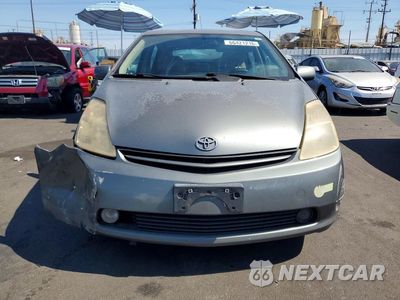 Piąte zdjęcie samochodu w środku: 2004 TOYOTA PRIUS BASE VIN:JTDKB20UX40106009 - miniatura