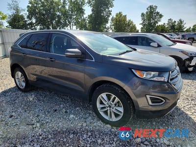Czwarte zdjęcie samochodu z boku: 2018 FORD EDGE SEL VIN:2FMPK4J98JBC00116 - miniatura