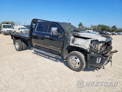 Czwarte zdjęcie samochodu z boku: 2020 GMC SIERRA K3500 DENALI VIN:1GT49WEY2LF214854 - miniatura