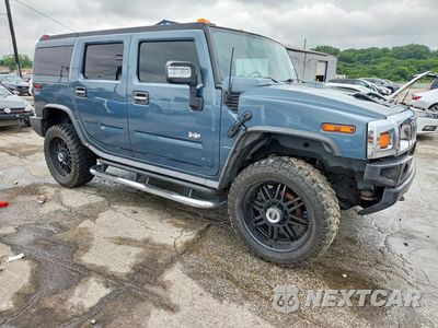 Czwarte zdjęcie samochodu z boku: 2006 HUMMER H2 VIN:5GRGN23U26H113161 - miniatura