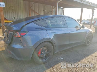 Trzecie zdjęcie samochodu z tyłu: 2022 TESLA MODEL Y VIN:7SAYGDEF1NF388872 - miniatura
