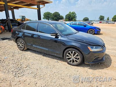 Czwarte zdjęcie samochodu z boku: 2017 VOLKSWAGEN JETTA SE VIN:3VWDB7AJ1HM324527 - miniatura