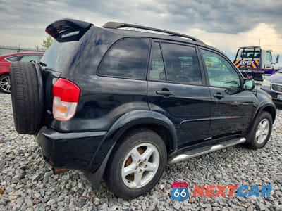 Trzecie zdjęcie samochodu z tyłu: 2002 TOYOTA RAV4 BASE VIN:JTEHH20V520180819 - miniatura
