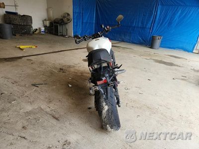 Czwarte zdjęcie samochodu z boku: 2024 YAMAHA MTM890 VIN:JYARN80E8RA001810 - miniatura