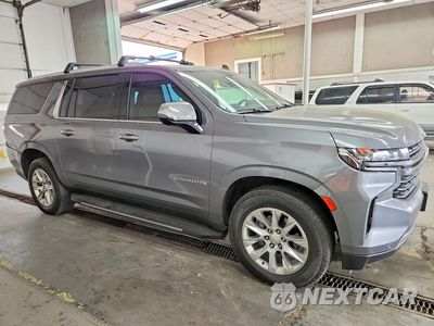 Czwarte zdjęcie samochodu z boku: 2022 CHEVROLET SUBURBAN K1500 PREMIER VIN:1GNSKFKD6NR102824 - miniatura